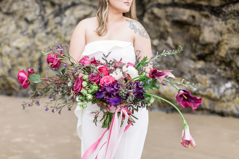 BLUE Floral Company designed a sprawling pink and purple bridal bouquet